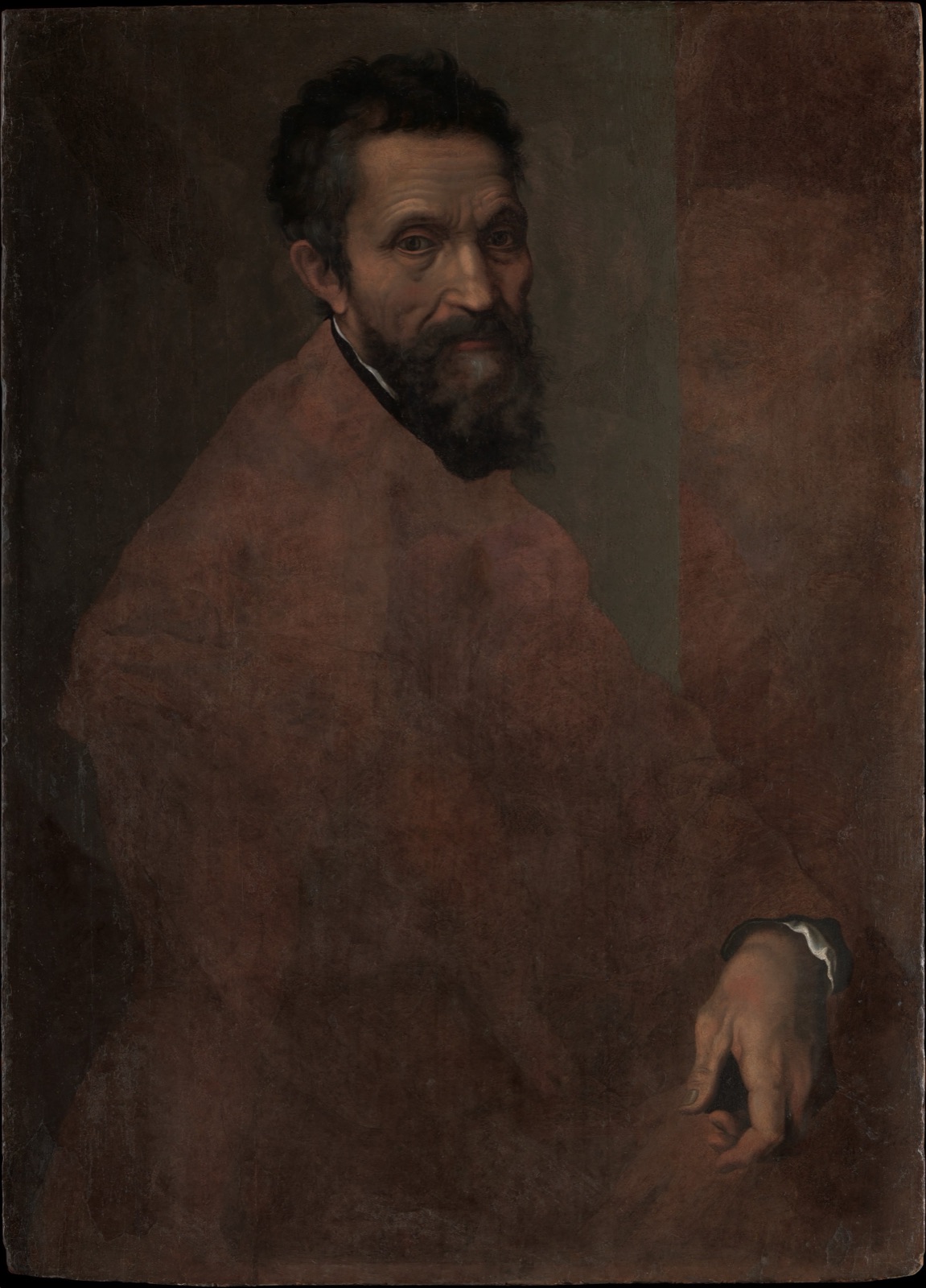 An unfinished portrait of Michelangelo at about seventy, with a dark beard and a lined face. Only the head and one hand are fully painted.