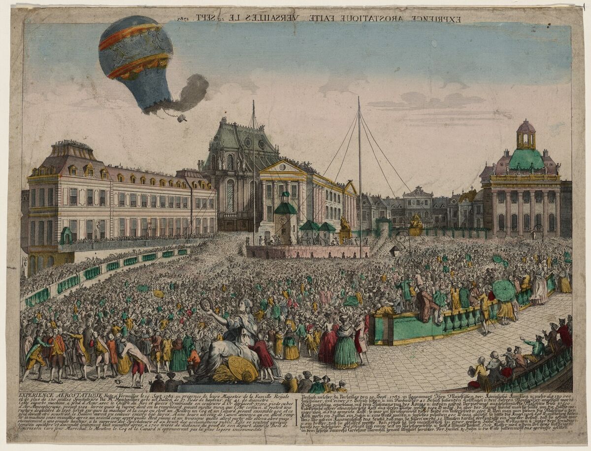 A hand-colored print of the balloon rising over the forecourt of Versailles, trailing smoke above a dense crowd.