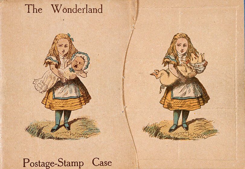 A small printed paper case titled The Wonderland Postage-Stamp Case, with a colored picture of Alice holding the Duchess’s baby on one side and the same Alice holding a pig on the other.